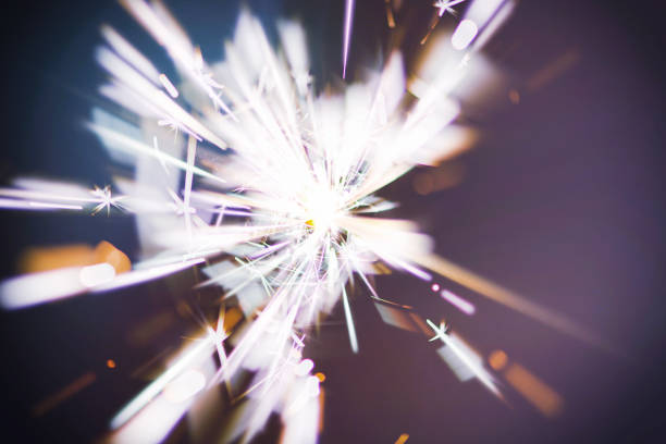 istock Sparks in the dark. Sparks. Christmas and New Year time. Magic light 1202347523