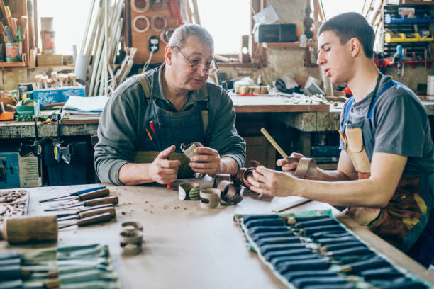 istock Father and son carpenters 1202349855