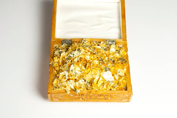 istock Opened single casket with golden foil as gold inside isolated on white with soft shadows, wooden box, wooden chest, treasure chest. 1202350142