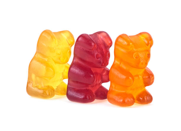 istock Three colorful gummy bears isolated on a white background 1202352578