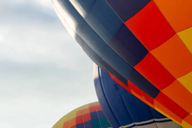 Balloons on the ground. Balloonists prepare the balloons for flight. Festival of aeronautics
