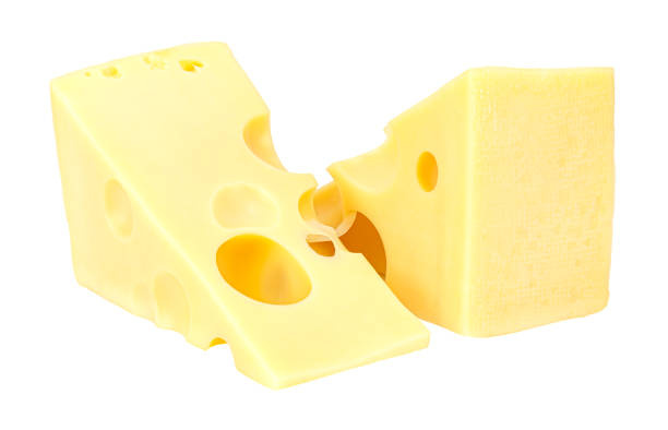 istock Lying two triangular pieces of Maasdam cheese isolated on a white background 1202358940