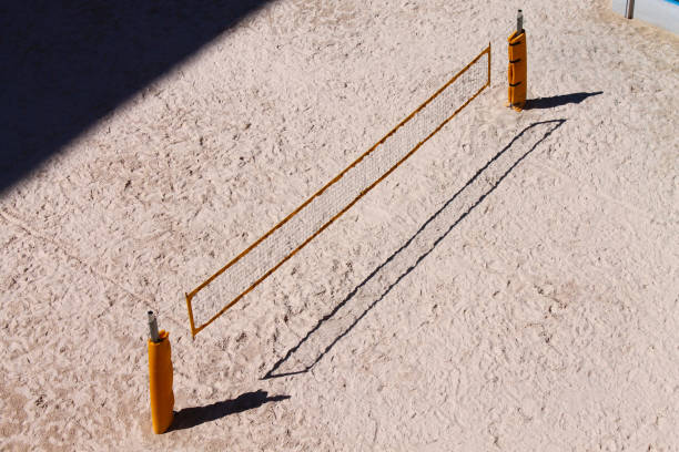 istock Sandy Beach volley field with yellow net 1202360541