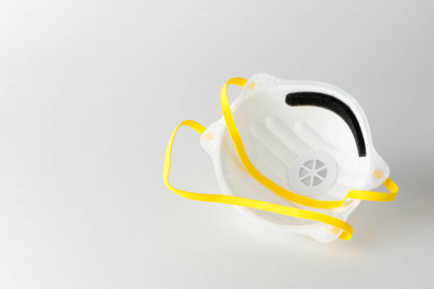 istock A N95 face mask in white background, with space for text 1202362916