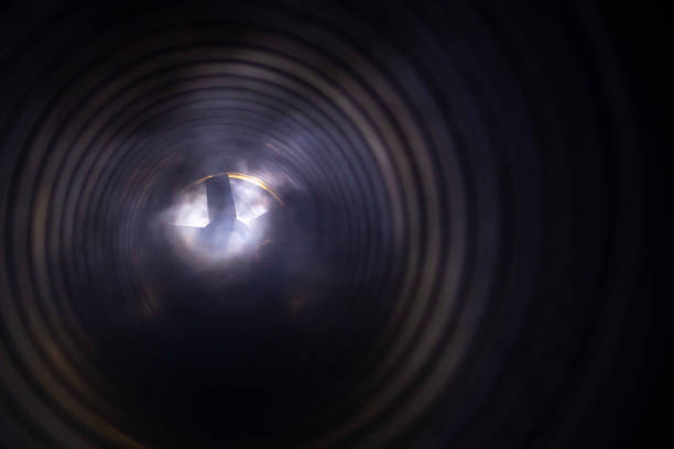 istock smoke and fire inside the air duct in the ventilation system, the front and back background is blurred with a bokeh effect 1202367393
