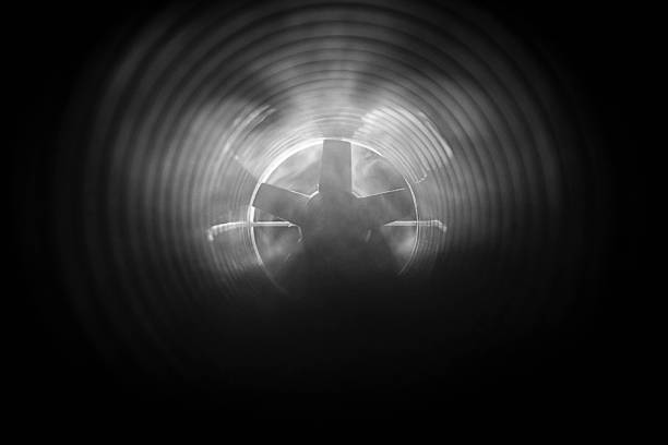 istock smoke and fire inside the air duct in the ventilation system, the front and back background is blurred with a bokeh effect 1202367416