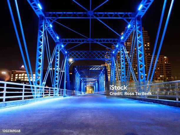 Blue Bridge Grand Rapids Michigan Lit Up At Night Stock Photo - Download Image Now