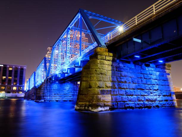 istock Blue Bridge,  Grand Rapids Michigan lit up at night. 1202369575