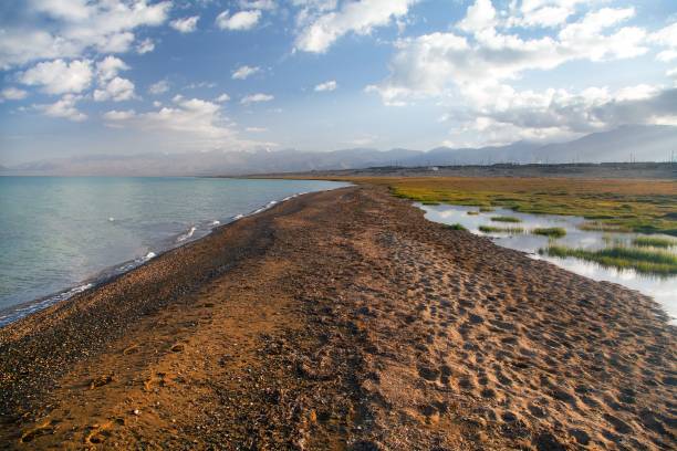 istock Karakul lake and Pamir range in Tajikistan 1202370321