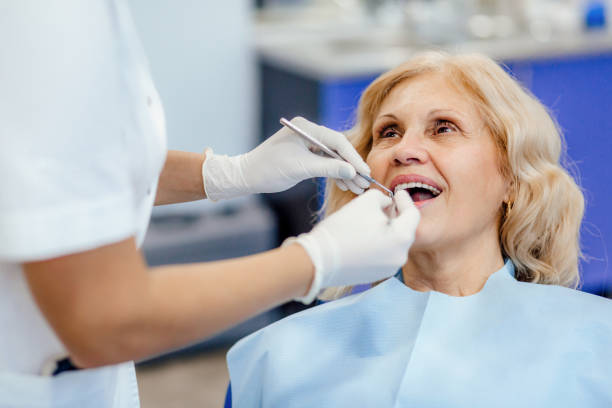 regular checkup at the dentist - dentist office dentists chair dental equipment white imagens e fotografias de stock