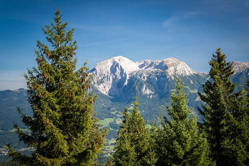 Mountains of the Berchtesgaden Alps under blue sky. \