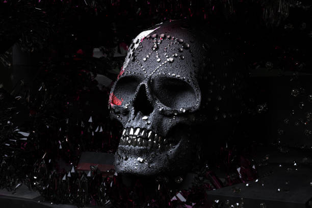 3d rendering. The concept of gold skulls on a gold ornament. Isolated black background