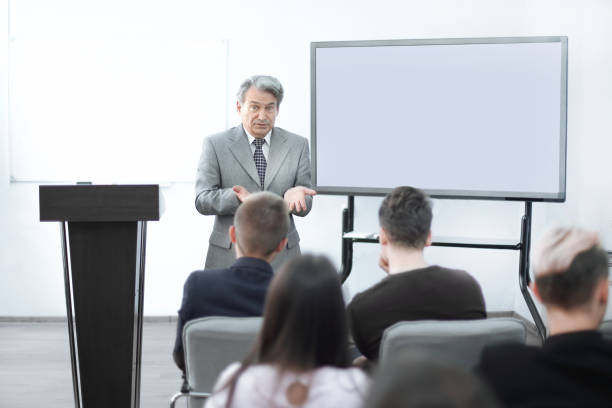 istock businessman discussing with business team financial schedule 1202383326