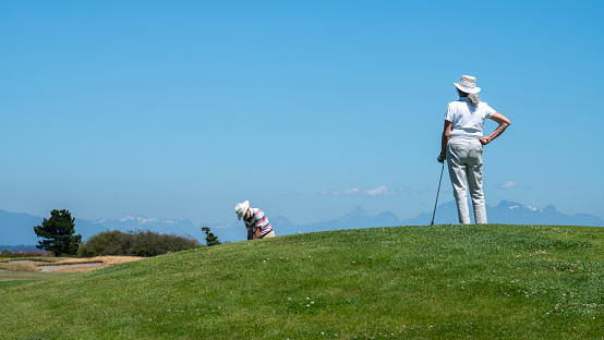 Active lifestyles, baby boomers and seniors playing golf