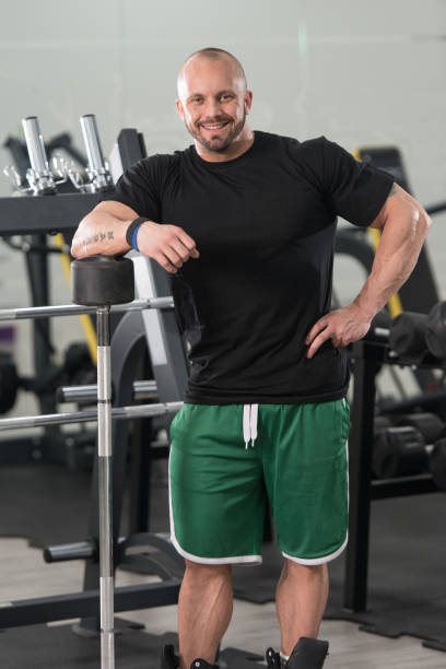 istock Athlete Relax After Exercise In Gym 1202384829