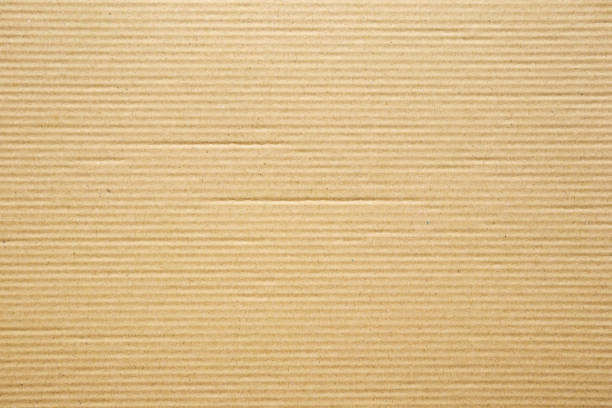 vieux fond recyclé de carton de texture de papier recyclé de brun - brown paper paper striped corrugated cardboard photos et images de collection