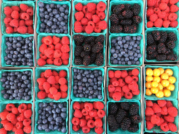 istock Colorful berries red blue yellow and purple 1202397447