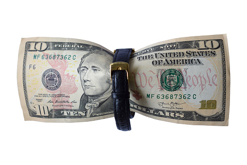 A 10 dollar bill with a black strap in the middle. Concept of saving money, budget cuts and expenses. Banknote of ten dollars on a white background, isolate.