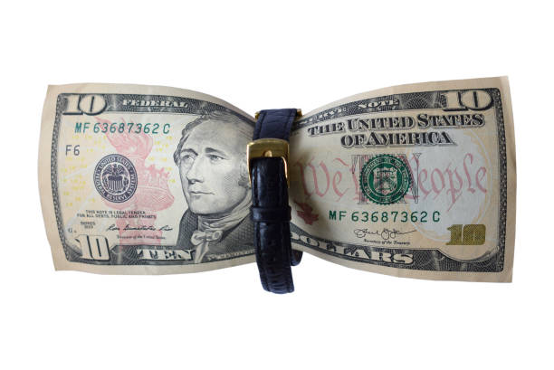 A 10 dollar bill with a black strap in the middle. A 10 dollar bill with a black strap in the middle. Concept of saving money, budget cuts and expenses. Banknote of ten dollars on a white background, isolate. budget cut stock pictures, royalty-free photos & images