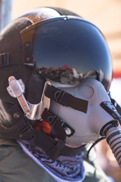 istock Pilot with suit and military air. Fighter pilot portrait posing 1202410181
