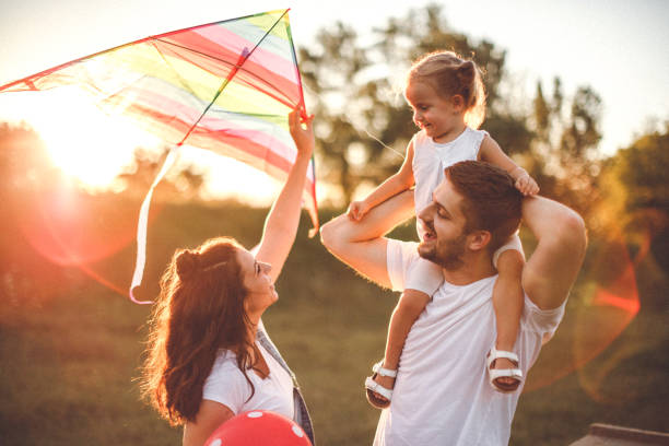 istock Happy family in nature 1202411297