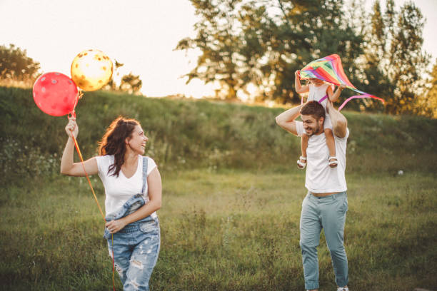 istock Happy family in nature 1202415281
