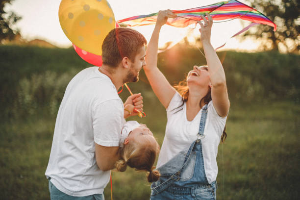 istock Smiled family playing in nature 1202415864