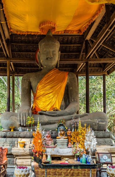 istock Buddhist monk dressed in ochre, saffron, yellowish robe 1202419411