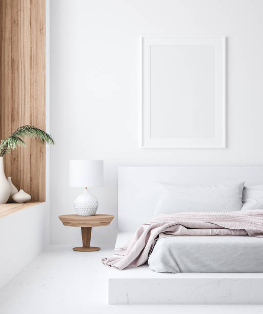 istock Mockup poster frame in white cozy bedroom interior, Scandinavian style 1202419935
