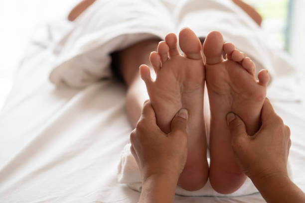 istock Close-up Foot massage in spa salon 1202422364