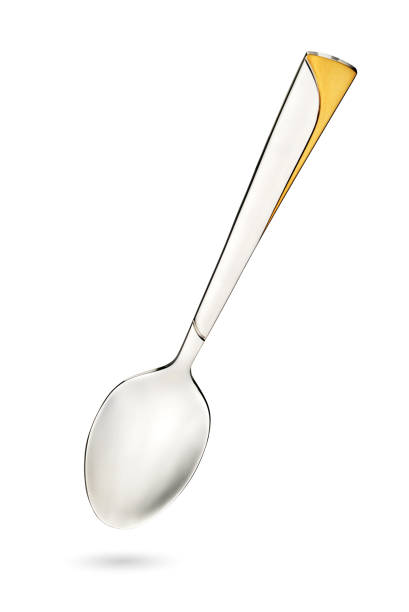 istock Empty steel tea spoon isolated on white background 1202424483
