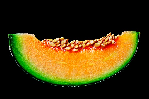 Melon and Slice of melon isolated on a white background