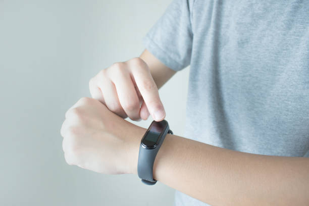 istock People are using a smart watch to check the heart rate. 1202431411