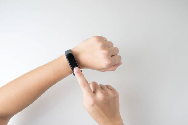 istock Use a smart watch on isolated white background. 1202431472