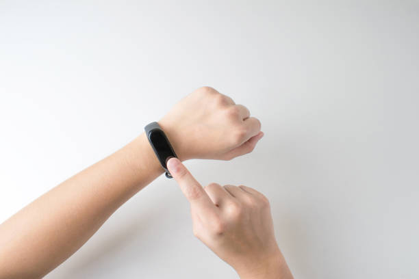 istock Finger touch some smart watch screen on isolated white background. Concept technology. 1202431480