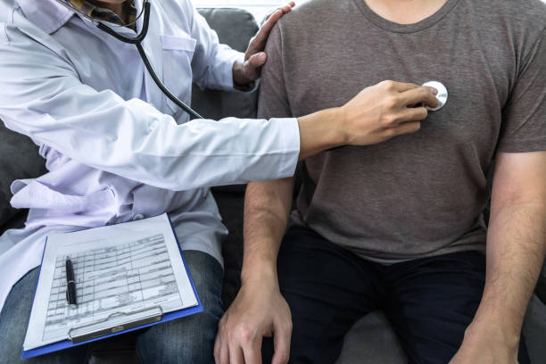 istock Doctor using a stethoscope checking patient about the problem of illness, sickness condition and recommend with examining treatment method 1202436789