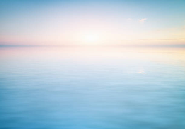 Calm water surface backgriund Peaceful pastel scene of a calm water surface. Element of backgriund design. calm water photos stock pictures, royalty-free photos & images