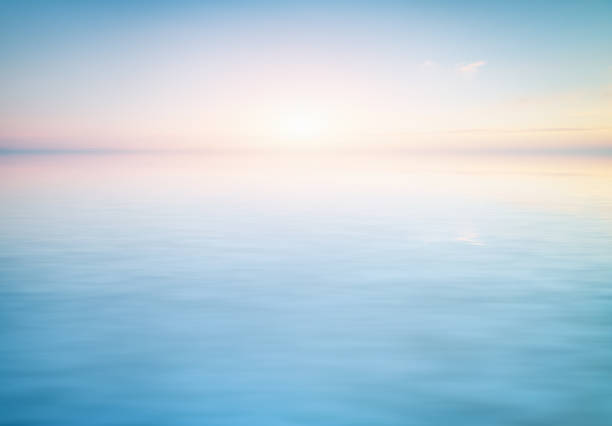 Calm water surface backgriund Peaceful pastel scene of a calm water surface. Element of backgriund design. still water stock pictures, royalty-free photos & images