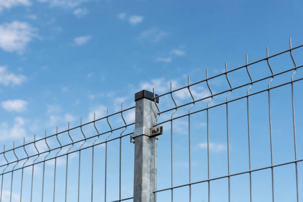 istock Industrial mesh fence 1202440375