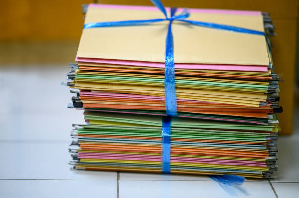 istock Colorful documents that the office is about to recycle 1202443650