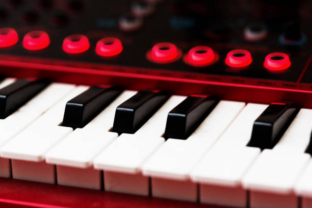 istock Electronic keyboard close-up showing some keys and controls 1202445106