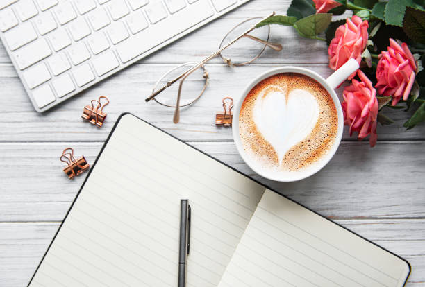 istock A cup of coffee with heart pattern on a table 1202445464