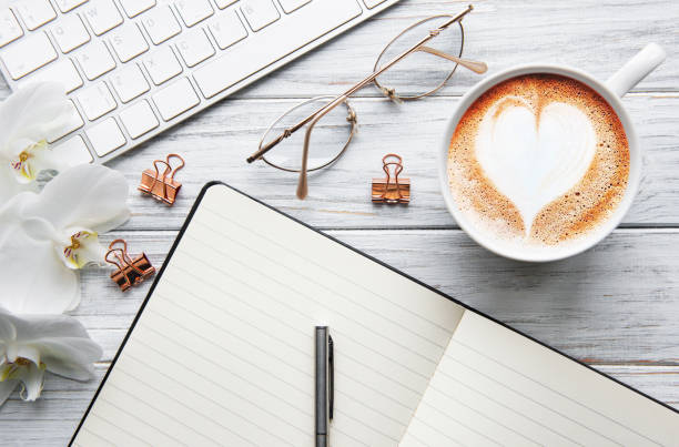 istock A cup of coffee with heart pattern on a table 1202445466
