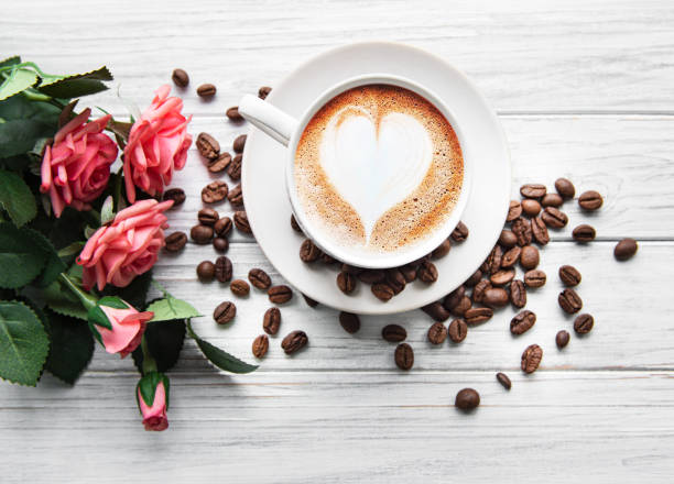 istock A cup of coffee with heart pattern on a table 1202445467