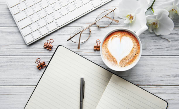 istock A cup of coffee with heart pattern on a table 1202445473
