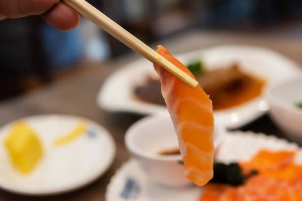 istock Fresh raw salmon fillet on board, closeup 1202445560