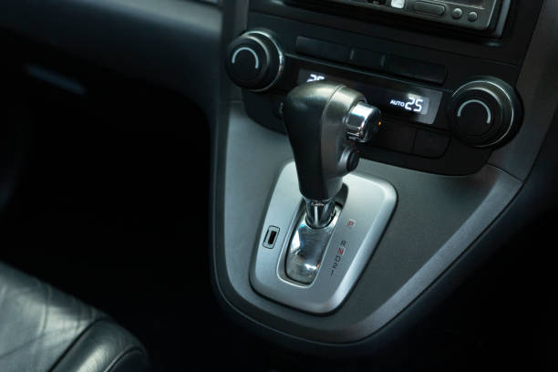 istock Put a gear stick into P position, (Parking) Symbol in auto transmission car. 1202445792