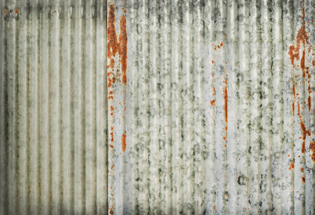 istock Old zinc wall texture background, rusty on galvanized metal panel sheeting. 1202449157