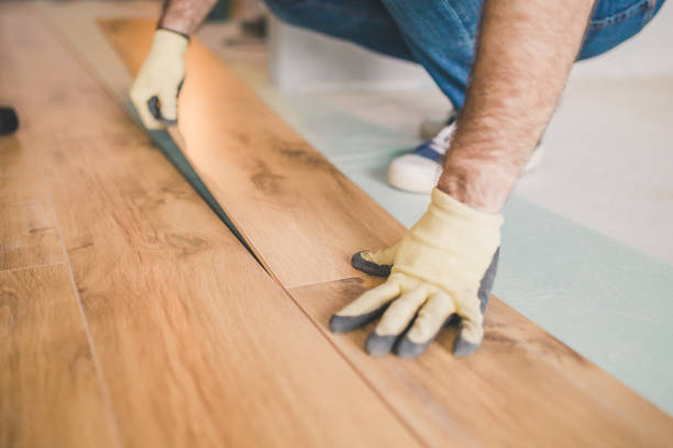 istock A man professionally mounts laminate in a floating way 1202450462