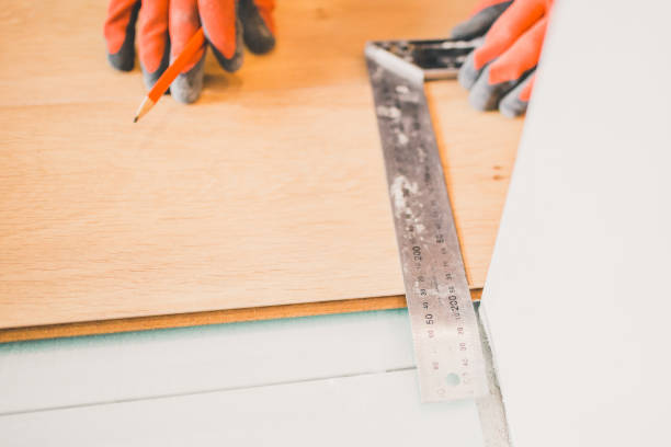 istock Measurement and marking of laminate for cutting 1202455167